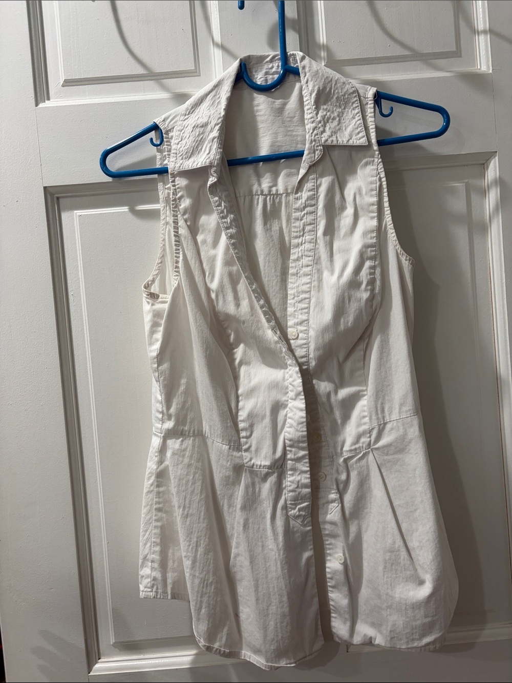 Sleeveless White Button-Front Collared Blouse